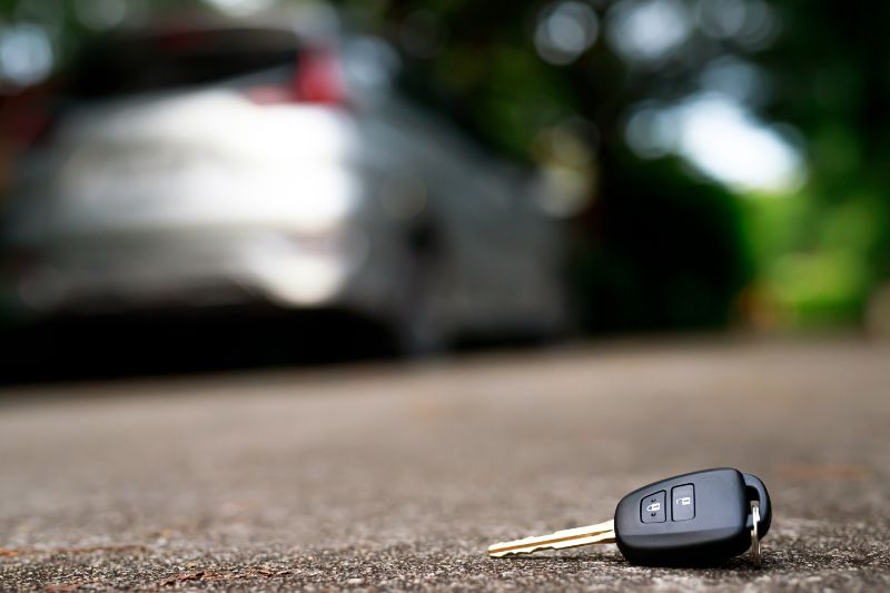 Lost car keys in Doncaster street, car in background.
